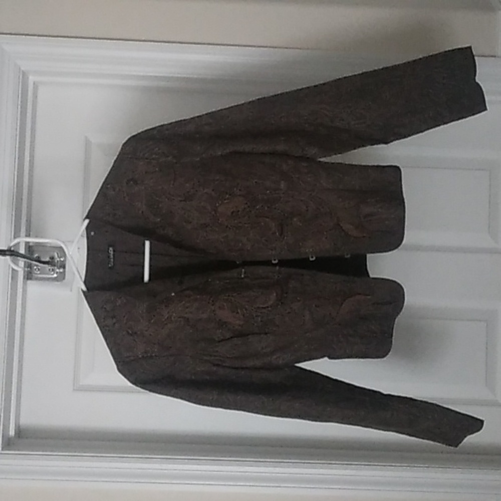 Tahari lightweight jacket marked small but fits more like an extra extra small.